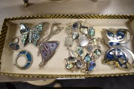 A quantity of silver tone jewellery having Paua shell decoration, including butterfly brooch and