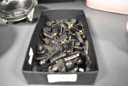 A selection of vintage and antique black beads.