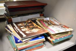 A selection of vintage children's annuals and ladybird books.