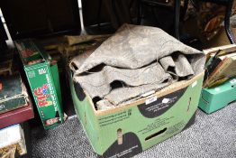 A box of vintage textiles and fabrics for haberdashery and crafts.