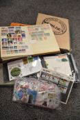 A box of world interest stamps and first day covers including albums.