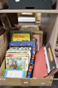 a collection of childrens story books including DR Seuss and a Lima car transporter.