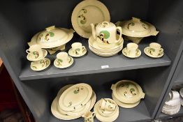 An Art Deco Royal Doulton Lynn pattern part tea and dinner service. Including lidded tureens,