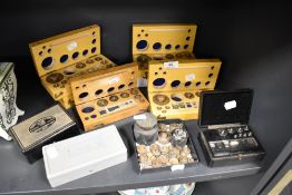 A collection of small size scale weight sets including Griffin and Tatlock
