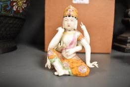 An early 20th century Tibetan Hindu figure of a Deity or Buddha bearing a four character seal mark
