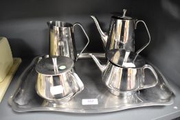 A Mid Century Orfinox polished steel tea set with tray.