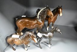 Three Beswick figure studies of horses including shire horse, foal and mare with a Royal Doulton