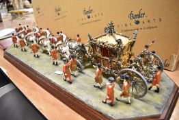 A Border Fine Arts 'The Coronation 1953' (Gold State Coach), model No. B0810 by Ray Ayres, issued