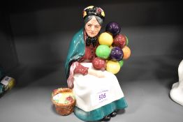 A Royal Doulton figure study of The Old Balloon Seller HN1315