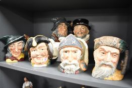 Six Royal Doulton character jugs including Pied Piper, Henry Morgan, Don Quixote, Robinson Crusoe,