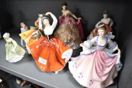 Eight Royal Doulton figurine studies including Wendy HN2109, Cherie HN2341, Top O The Hill HN2127,