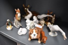 A collection of animal studies including Royal Doulton, Lomonosov, Coalport, Lladro and Royal