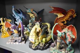 Nine fantasy dragon figure studies including Leonardo collection and Land of the Dragons