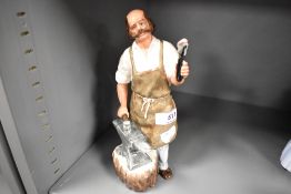 A Royal Doulton figure study the Blacksmith HN2782