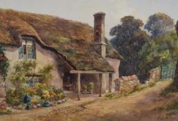 Lewis Mortimer, (19th/20th century), a watercolour, thatched country cottage, signed and dated 1920,
