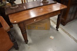 A 19th Century mahogany extending dining table in the Gillows style