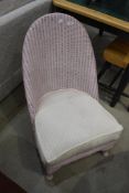 A Lloyd Loom nursing chair
