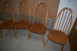 A set of four Ercol high back kitchen dining chairs
