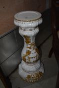 A ceramic jardiniere stand having painted decoration in the Continental style , no marks, height