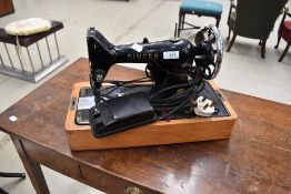A vintage Singer Sewing machine, electric, model 99K, no case