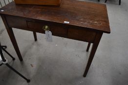 A 19th century oak side table with frieze drawer having brass handle, width approx. 95cm