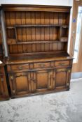 A reproduction oak dresser, probably Titchmarsh and Goodwin