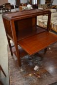 An Edwardian mahogany occasional table/cabinet having drop flap to side