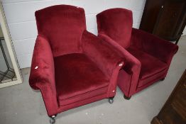 A pair of early 20th Century easy chairs