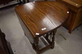 A nice quality modern reproduction drop leaf occasional/coffee table