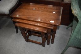A modern oak nest of three tables, nice quality solid