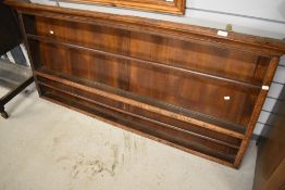 A period style oak dresser back, width approx. 162cm