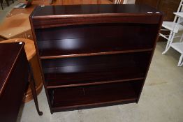 A reproduction mahogany effect bookshelf, width approx. 90cm