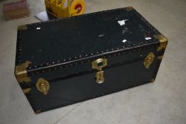 A vintage travel trunk, labelled Herald, dimensions approx. 92 x 52 x 41