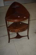 A 19th Century mahogany corner washstand, having central frieze drawer flanked by two dummies