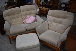A modern elm framed two-piece lounge suite, comprising two seater settee and chair and sold together