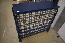 A folding guest bed