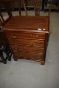 A modern small mahogany chest of four drawers in the period style, width approx. 61cm