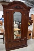 A Victorian mahogany mirror door wardrobe having drawer base, width approx 120cm