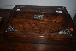A fine 19th Century Rosewood lap desk having fitted interior and inlaid mother of pearl