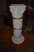 A resin moulded jardiniere stand, in the classical style with harvester decoration, height approx.
