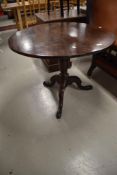 A 19th Century mahogany pedestal table having turned column on triple splay legs