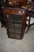 A Georgian mahogany glazed corner wall cabinet