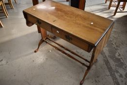 A Regency revival side table having drop flaps