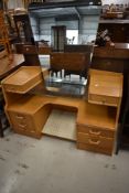 A mid 20th Century golden oak dressing table, E Gomme , G Plan