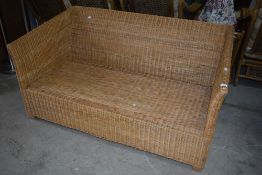 A modern wicker settee, width approx. 147cm