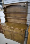 A vintage Old Charm or similar oak dresser