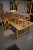 A modern Ikea extending dining table (norden) and set of ten (adam) siilar dining chairs