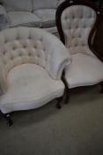 A reproduction spoon back nursing chair and similar upholstered button back tub chair