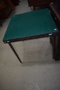 A traditional square card table with green felt top and folding legs, width approx. 71cm