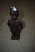A vintage metal companion stand (no tools) modelled as boy, height approx. 47cm
